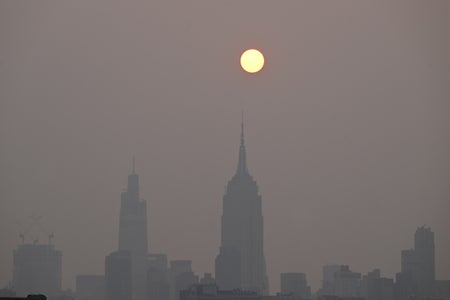 Sun rises in smoky sky in New York City because of Canadian wildfires