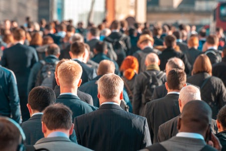 Rear-view of pedestrians in suits