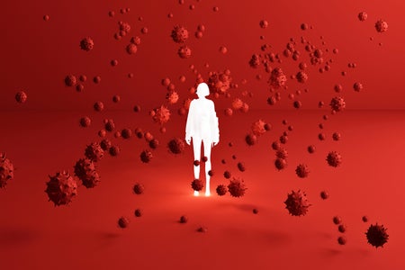 Glowing white human figure surrounding by red coronaviruses in a large red room
